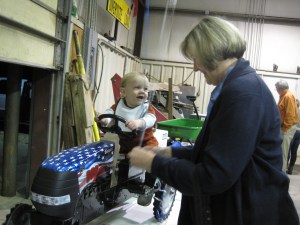 child on Case pedal tractor