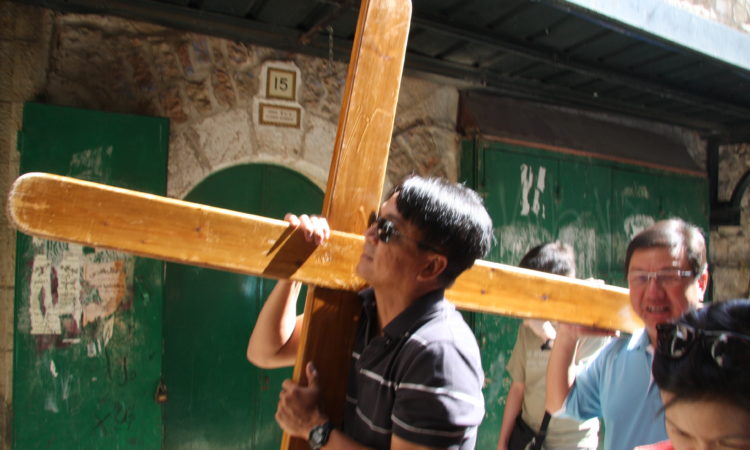 Carrying the cross in Jerusalem