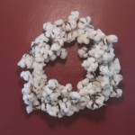 a wreath made of cotton bolls that was a housewarming gift