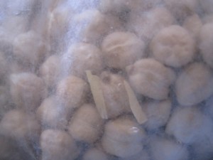 closeup of garbanzos in a ziploc pre-cleaning
