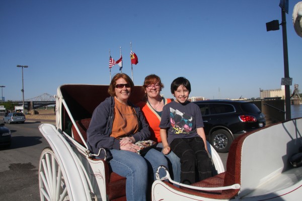 taking a carriage ride by the Arch