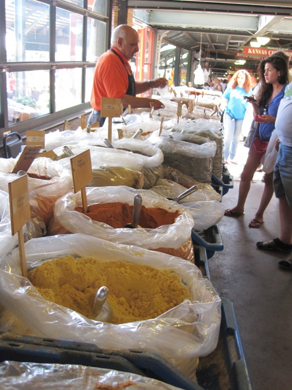 spice seller at farmers market