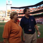 April Hemmes visits with a member of the Cardinals office