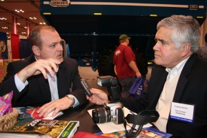 Kevin Eblen talking to Tommy Horton about cotton during the Gin Show