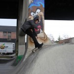 skater riding the top of the chute