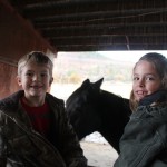 Kyle & his cousin in the barn