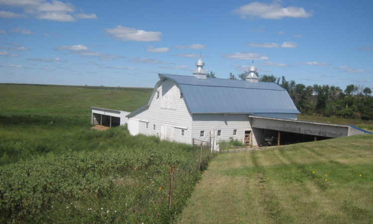 farm land with a barn