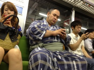 sumo wrestler on the subway