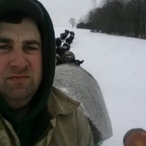 farmer working in the snow