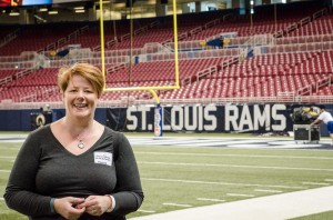 Janice Person on the field at the Rams game