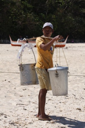 Filipino vendor on puka beach